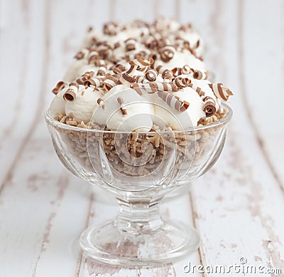 Transparent cups with chestnut puree, white cream and chocolate twirls Stock Photo