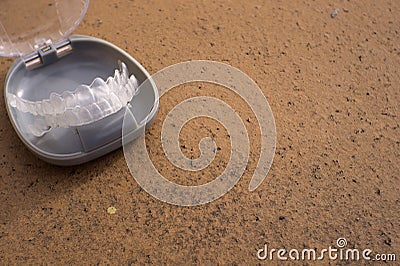 Transparent dental orthodontics in a protective box Stock Photo