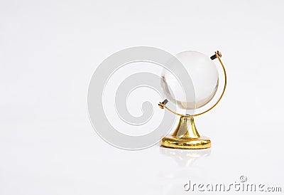 Transparent globe object with gold base Stock Photo