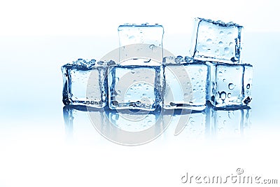 Transparent ice cubes group on white background with water drops Stock Photo