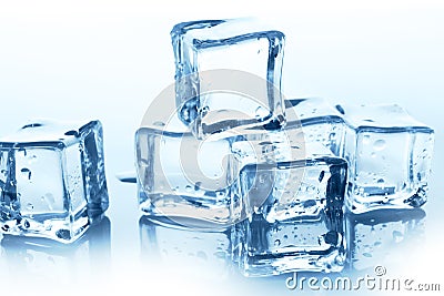 Transparent ice cubes group on white background with water drops Stock Photo