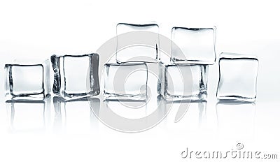 Transparent ice cubes group on white background with water drops Stock Photo