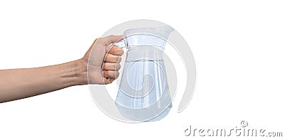 Transparent jar of water, carafe glass in hand isolated on a white background photo Stock Photo
