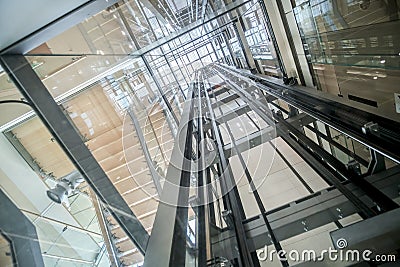 Transparent lift modern elevator shaft glass building Stock Photo