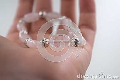 Transparent pink quartz and silver crystal balls bracelet Stock Photo