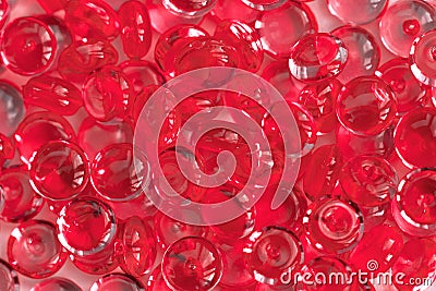 Transparent red glass marble beads Stock Photo