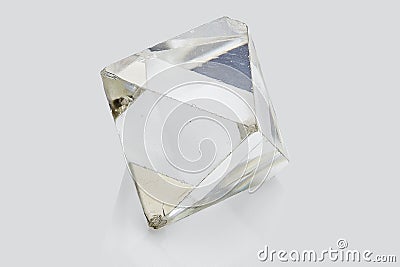 Transparent rough diamond isolated on white background Stock Photo