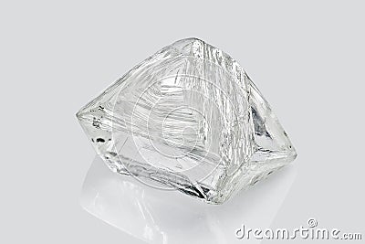 Transparent rough diamond isolated on white background Stock Photo