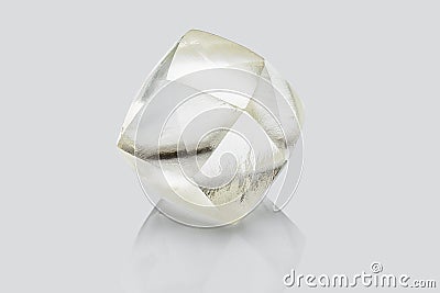 Transparent rough diamond isolated on white background Stock Photo