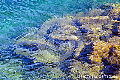 Transparent water of the mediterranean sea and stone Stock Photo