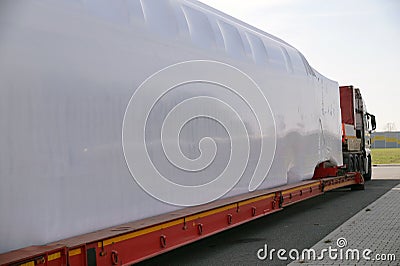Transport of oversized goods. Special truck and semi-trailer Stock Photo