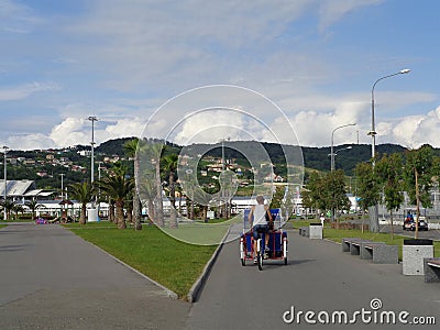 Transport in Sochi Olympic Park, velomobiles and electric cars Editorial Stock Photo