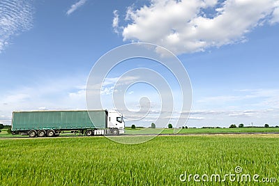 Transport truck driving on the road Stock Photo