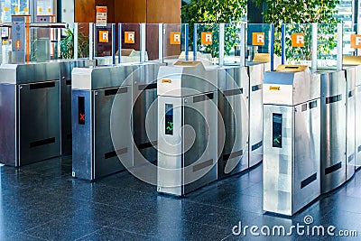 Transport turnstile, entrance and exit. red light no access Stock Photo