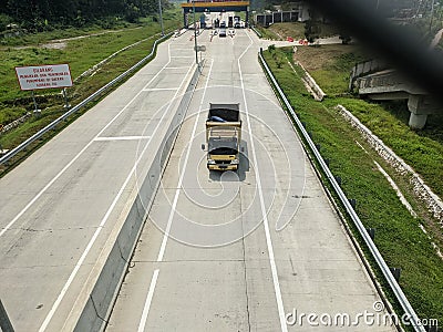 Transportation activities at the Trans Java toll gate exit Semarang toll road, Indonesia Stock Photo