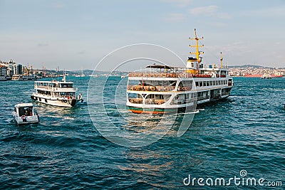 Transportation of local residents and tourists by sea via the Bosphorus in Istanbul. Scenic panoramic view. Travel, rest Editorial Stock Photo