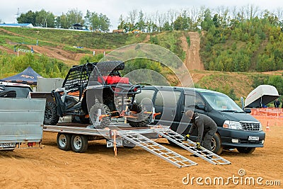 Transportation of a sports car on a trailer Editorial Stock Photo