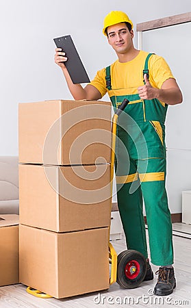 Transportation worker delivering boxes to house Stock Photo