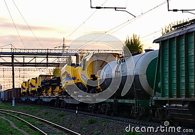 Transporting combine harvesters by rail. Editorial Stock Photo