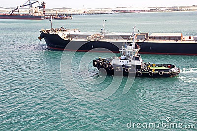 Transshipment terminal for loading steel products to sea vessels using shore cranes and special equipment in Port Pecem, Brazil, Stock Photo