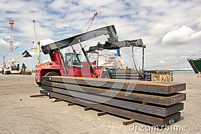 Transshipment terminal for loading steel products to sea vessels using shore cranes and special equipment in Port Pecem, Brazil, Editorial Stock Photo