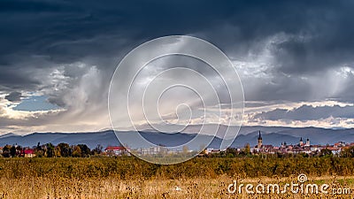 Transylvania village with Carpathian mountains in the background in autumn time , Romania Stock Photo