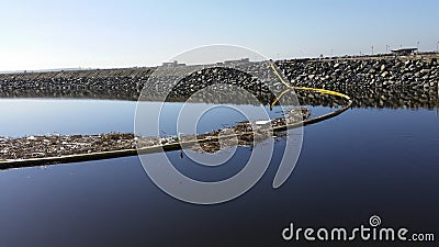 Trash being swept to the ocean Stock Photo