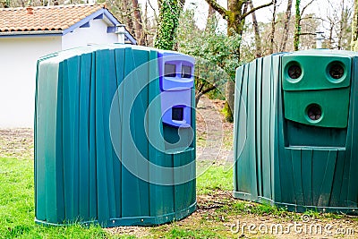 Trash cans for separate recycling garbage glass and paper in city Ecology protection of nature Editorial Stock Photo