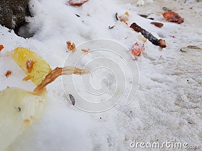 Trash and garbage bags on snow Stock Photo