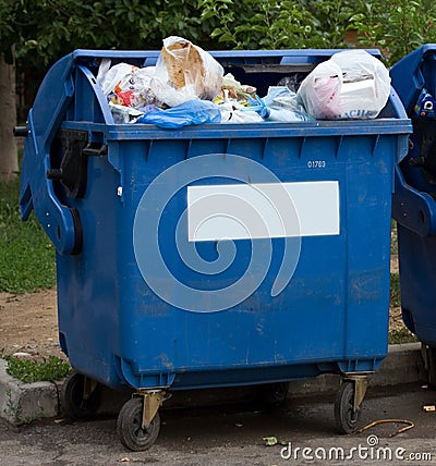 Trash garbage full container in street Stock Photo