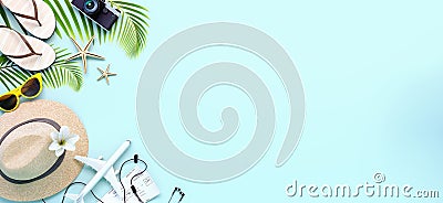 Travel accessories on light blue background, getting ready for summer vacation Stock Photo