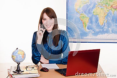 Travel agency employee at work Stock Photo