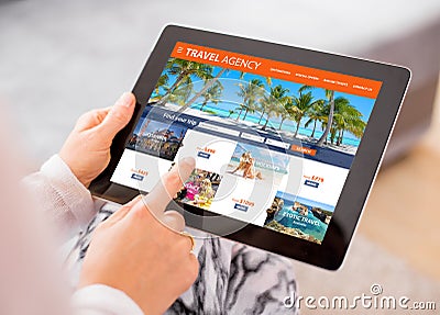 Travel agency`s website on tablet computer Stock Photo