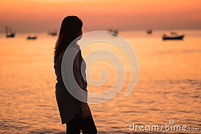 Travel background beautiful young women stand alone beach with s Stock Photo