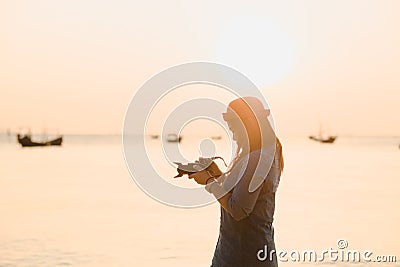 Travel background beautiful young women stand alone beach with s Stock Photo