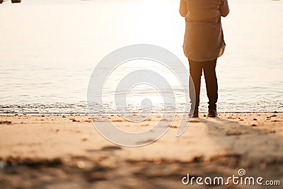 Travel background beautiful young women stand alone beach with s Stock Photo