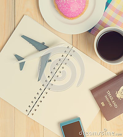 Travel Blank book for planner in cafe with coffee and donut Stock Photo