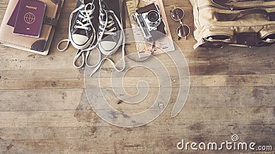 Travel concept with passport camera map bag on wooden background Stock Photo