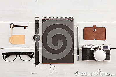 travel concept - set of cool stuff with camera and other things on wooden table Stock Photo