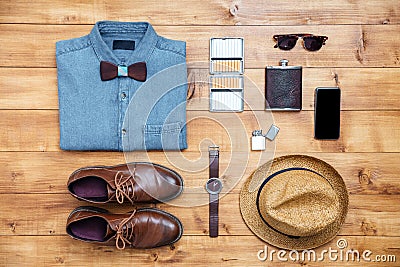 Travel concept shoes, shirt, mobile phone, watch, flask, eyeglasses, hat Stock Photo