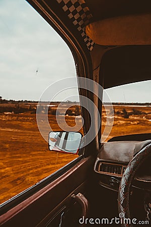 Car , travel , mirror , desert , place , trip , sky , glass Stock Photo