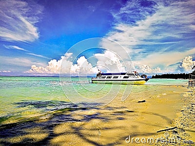 Travel destination, Malaysia. Flag of Sabah on sailing boat Mantanani Island Editorial Stock Photo