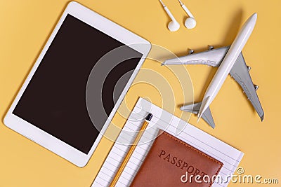 Travel gadgets flat lay yellow for travel concept Stock Photo