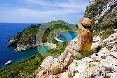 Travel in Greece. Female hiker girl enjoying natural landscape in Corfu Island, Greece Stock Photo