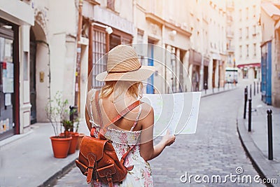 Travel guide, tourism in Europe, woman tourist with map Stock Photo