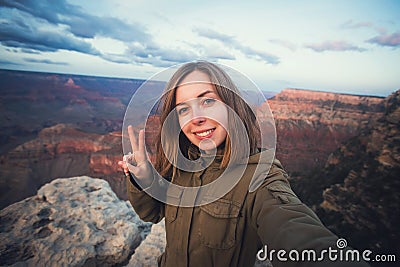 Travel hiking selfie photo of young beautiful teenager student at Grand Canyon viewpoint in Arizona Stock Photo