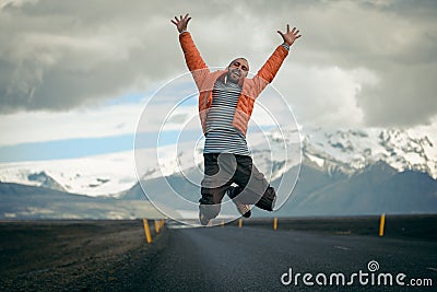 Travel hitchhiker man on a road Stock Photo