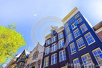 Travel Ideas and Concepts. Traditional Amsterdam Houses Stock Photo