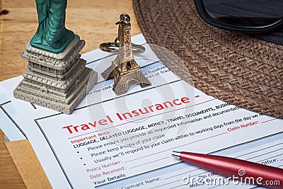 Travel Insurance Claim application form and hat with eyeglass an Stock Photo