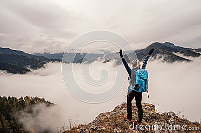 Travel lifestyle concept. Adventure summer vacations outdoor. Gilr enjoying day in the mountain. Stock Photo